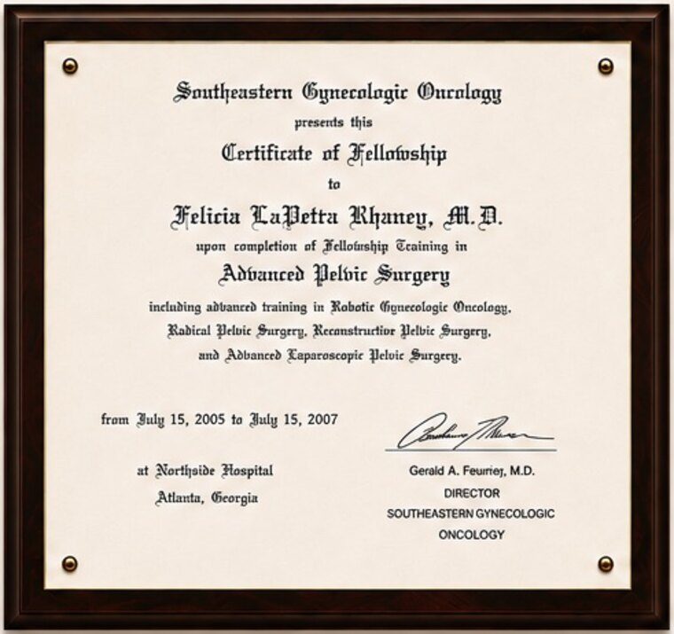 Framed Certificate of Fellowship presented to Felicia LaVetta Rhaney, M.D. by Southeastern Gynecologic Oncology upon completion of fellowship training in Advanced Pelvic Surgery, in a cherry-wood frame.